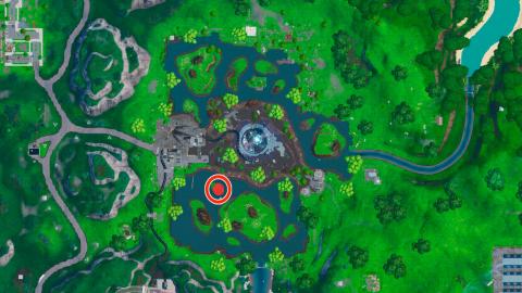 Visit a monument to a cube in the desert or by a lake in Fortnite, Clash of Worlds missions