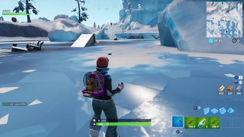 Slide a single throw ice puck over 150m in Fortnite
